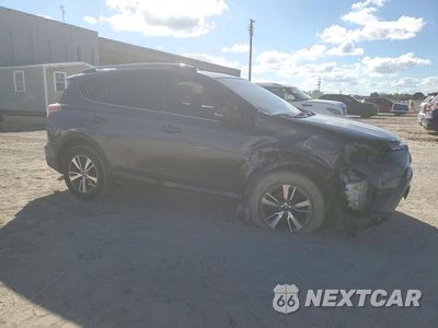 Czwarte zdjęcie samochodu z boku: 2018 TOYOTA RAV4 XLE VIN:JTMWFREV5JD132392 - miniatura