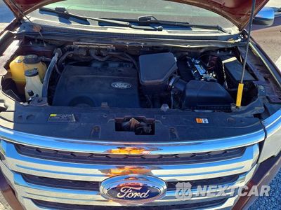 Zdjęcie 12 z 13 samochodu: 2012 FORD EDGE SEL VIN:2FMDK3JC8CBA53825 - miniatura