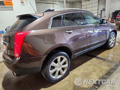 Trzecie zdjęcie samochodu z tyłu: 2016 CADILLAC SRX PERFORMANCE COLLECTION VIN:3GYFNCE37GS515171 - miniatura