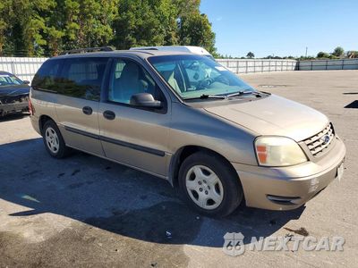 Czwarte zdjęcie samochodu z boku: 2006 FORD FREESTAR SE VIN:2FMZA51626BA54925 - miniatura