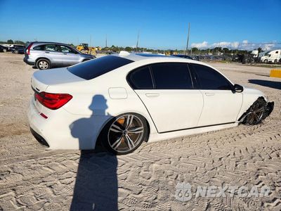 Trzecie zdjęcie samochodu z tyłu: 2018 BMW 750 I VIN:WBA7F0C53JGM23732 - miniatura