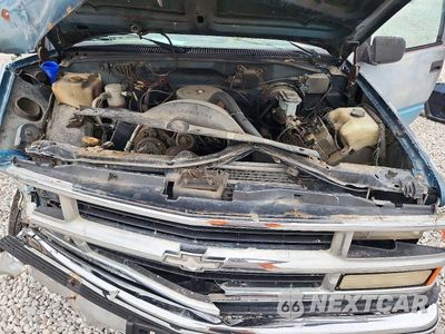 Zdjęcie 12 z 14 samochodu: 1992 GMC SUBURBAN C1500 VIN:1GKEC16K2NJ703018 - miniatura