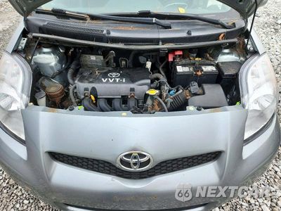 Zdjęcie 11 z 12 samochodu: 2009 TOYOTA YARIS BASE VIN:JTDKT903995244017 - miniatura