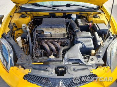 Zdjęcie 11 z 12 samochodu: 2009 MITSUBISHI ECLIPSE GS VIN:4A3AK24F19E021610 - miniatura