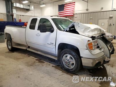 Czwarte zdjęcie samochodu z boku: 2009 GMC SIERRA C3500 SLT VIN:1GTJC99699E129460 - miniatura