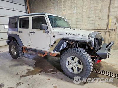 Czwarte zdjęcie samochodu z boku: 2010 JEEP WRANGLER UNLIMITED RUBICON VIN:1J4BA6H13AL111450 - miniatura