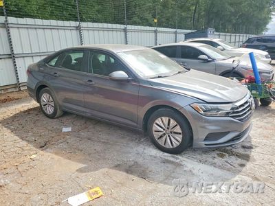Czwarte zdjęcie samochodu z boku: 2019 VOLKSWAGEN JETTA S VIN:3VWC57BU8KM193437 - miniatura