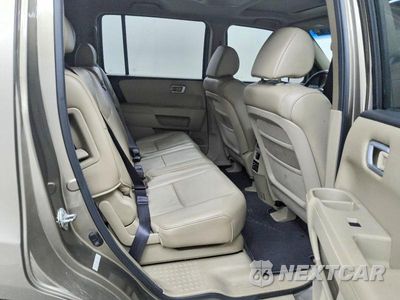 Zdjęcie 11 z 13 samochodu: 2011 HONDA PILOT EXL VIN:5FNYF3H66BB043273 - miniatura
