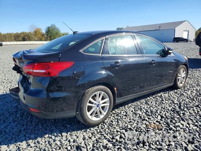 Trzecie zdjęcie samochodu z tyłu: 2016 FORD FOCUS SE VIN:1FADP3F29GL368604 - miniatura