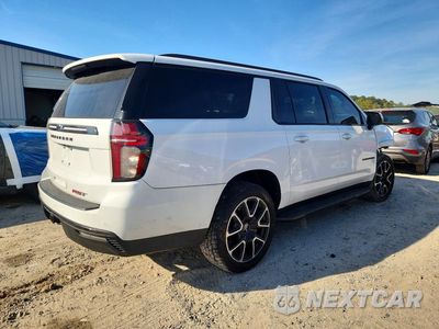 Trzecie zdjęcie samochodu z tyłu: 2021 CHEVROLET SUBURBAN K1500 RST VIN:1GNSKEKD9MR176683 - miniatura