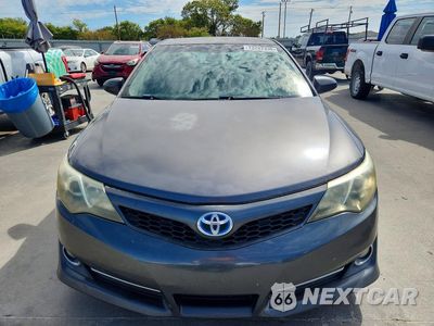 Piąte zdjęcie samochodu w środku: 2014 TOYOTA CAMRY HYBRID SE VIN:4T1BD1FK4EU122044 - miniatura