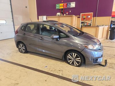 Czwarte zdjęcie samochodu z boku: 2015 HONDA FIT EX VIN:3HGGK5H86FM714593 - miniatura