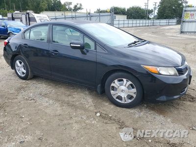 Czwarte zdjęcie samochodu z boku: 2012 HONDA CIVIC HYBRID VIN:JHMFB4F24CS010011 - miniatura