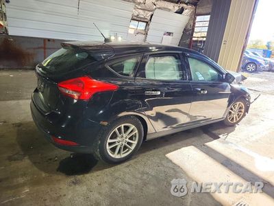 Trzecie zdjęcie samochodu z tyłu: 2016 FORD FOCUS SE VIN:1FADP3K21GL294097 - miniatura