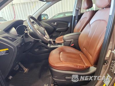Zdjęcie 7 z 13 samochodu: 2013 HYUNDAI TUCSON LIMITED VIN:KM8JU3AC9DU611464 - miniatura