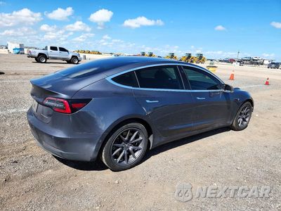 Trzecie zdjęcie samochodu z tyłu: 2020 TESLA MODEL 3 VIN:5YJ3E1EB3LF663955 - miniatura