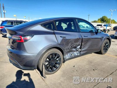 Trzecie zdjęcie samochodu z tyłu: 2020 TESLA MODEL Y VIN:5YJYGDEE3LF052044 - miniatura
