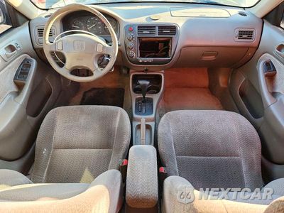 Zdjęcie 8 z 12 samochodu: 1999 HONDA CIVIC LX VIN:2HGEJ6671XH546825 - miniatura
