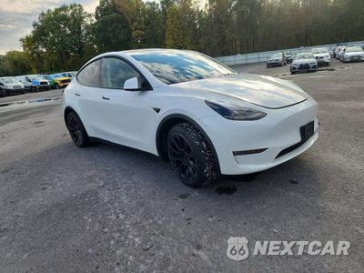 Czwarte zdjęcie samochodu z boku: 2024 TESLA MODEL Y VIN:7SAYGAEE0RF011400 - miniatura