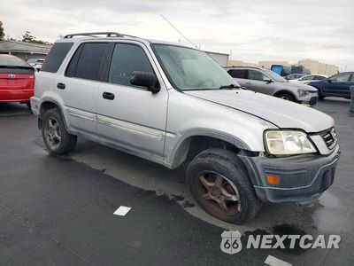 Czwarte zdjęcie samochodu z boku: 1999 HONDA CR-V LX VIN:JHLRD1843XC074209 - miniatura