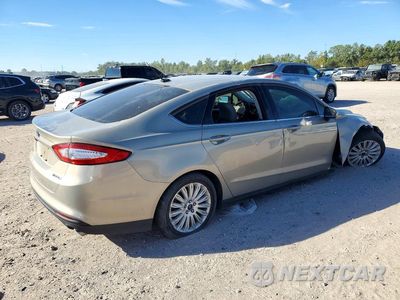 Trzecie zdjęcie samochodu z tyłu: 2016 FORD FUSION S HYBRID VIN:3FA6P0UU4GR126669 - miniatura