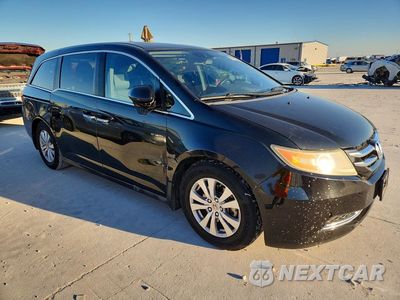Czwarte zdjęcie samochodu z boku: 2014 HONDA ODYSSEY EXL VIN:5FNRL5H64EB074079 - miniatura