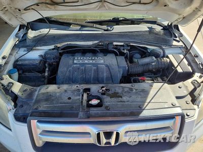 Zdjęcie 12 z 13 samochodu: 2007 HONDA PILOT EXL VIN:2HKYF18517H507302 - miniatura