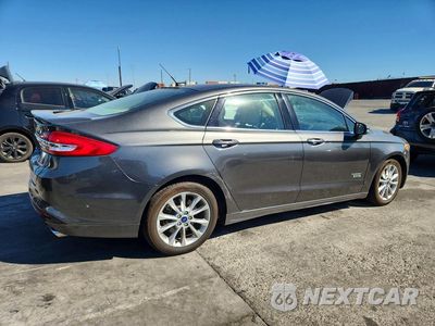Trzecie zdjęcie samochodu z tyłu: 2017 FORD FUSION TITANIUM PHEV VIN:3FA6P0SU3HR255510 - miniatura