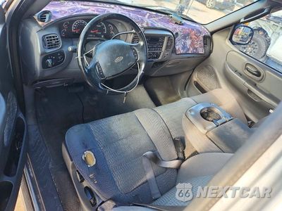 Zdjęcie 8 z 13 samochodu: 2002 FORD F150 VIN:2FTRX07L02CA81080 - miniatura