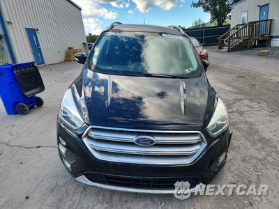Piąte zdjęcie samochodu w środku: 2017 FORD ESCAPE TITANIUM VIN:1FMCU9JDXHUC42303 - miniatura