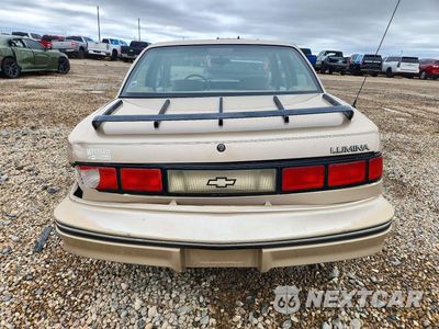 Zdjęcie 6 z 12 samochodu: 1994 CHEVROLET LUMINA VIN:2G1WL54T6R9110517 - miniatura
