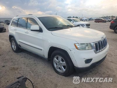 Czwarte zdjęcie samochodu z boku: 2011 JEEP GRAND CHEROKEE LAREDO VIN:1J4RR4GG9BC551062 - miniatura