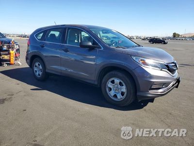 Czwarte zdjęcie samochodu z boku: 2016 HONDA CR-V LX VIN:2HKRM3H3XGH564084 - miniatura