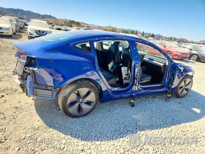 Trzecie zdjęcie samochodu z tyłu: 2020 TESLA MODEL 3 VIN:5YJ3E1EA3LF705841 - miniatura