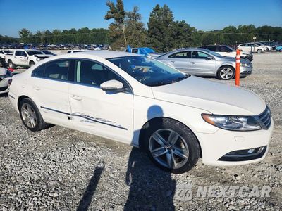 Czwarte zdjęcie samochodu z boku: 2014 VOLKSWAGEN CC SPORT VIN:WVWBP7AN1EE523478 - miniatura