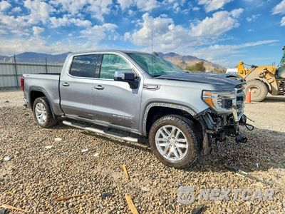 Czwarte zdjęcie samochodu z boku: 2021 GMC SIERRA K1500 SLE VIN:3GTU9BET1MG277733 - miniatura