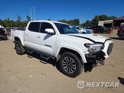 Czwarte zdjęcie samochodu z boku: 2022 TOYOTA TACOMA TRD SPORT VIN:3TMCZ5AN7NM512014 - miniatura