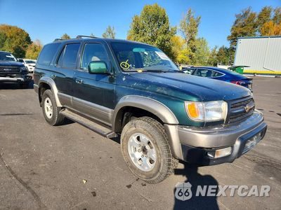 Czwarte zdjęcie samochodu z boku: 1999 TOYOTA 4RUNNER LIMITED VIN:JT3HN87R4X9027882 - miniatura