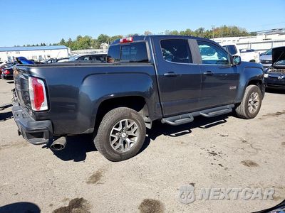 Trzecie zdjęcie samochodu z tyłu: 2016 GMC CANYON SLE VIN:1GTG6CE39G1356971 - miniatura