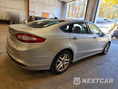 Trzecie zdjęcie samochodu z tyłu: 2016 FORD FUSION SE VIN:3FA6P0HDXGR162148 - miniatura