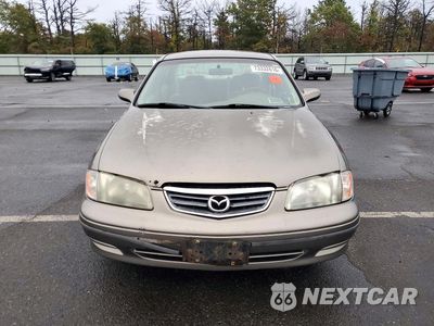 Piąte zdjęcie samochodu w środku: 2002 MAZDA 626 LX VIN:1YVGF22C025298789 - miniatura