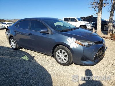 Czwarte zdjęcie samochodu z boku: 2017 TOYOTA COROLLA L VIN:5YFBURHE0HP582197 - miniatura