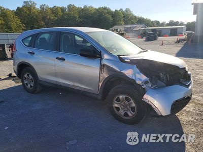 Czwarte zdjęcie samochodu z boku: 2014 HONDA CR-V LX VIN:2HKRM4H37EH721461 - miniatura