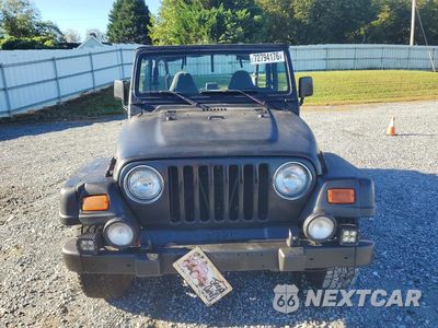 Piąte zdjęcie samochodu w środku: 2000 JEEP WRANGLER / TJ SAHARA VIN:1J4FA59S4YP802394 - miniatura