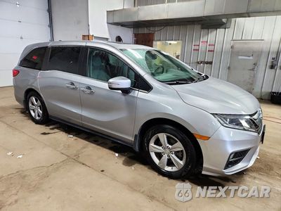 Czwarte zdjęcie samochodu z boku: 2018 HONDA ODYSSEY EXL VIN:5FNRL6H77JB083092 - miniatura