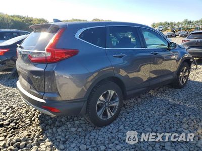 Trzecie zdjęcie samochodu z tyłu: 2017 HONDA CR-V LX VIN:2HKRW2H23HH119053 - miniatura