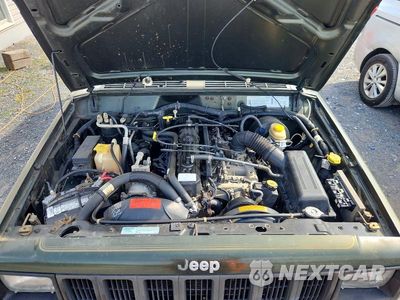 Zdjęcie 12 z 13 samochodu: 1997 JEEP CHEROKEE SPORT VIN:1J4FJ68S2VL609798 - miniatura