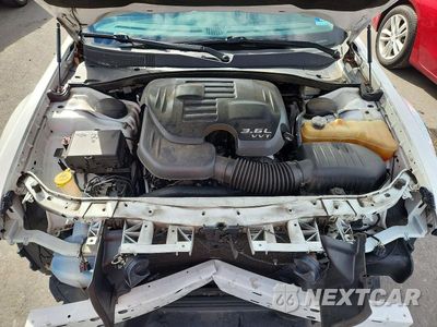 Zdjęcie 11 z 12 samochodu: 2015 CHRYSLER 300 LIMITED VIN:2C3CCAAG9FH785858 - miniatura