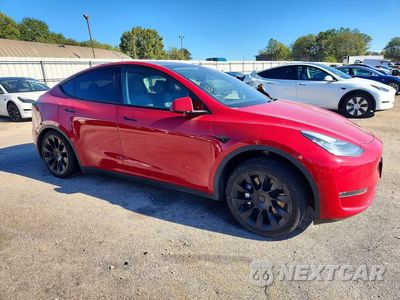 Czwarte zdjęcie samochodu z boku: 2022 TESLA MODEL Y VIN:7SAYGDEE7NF368648 - miniatura