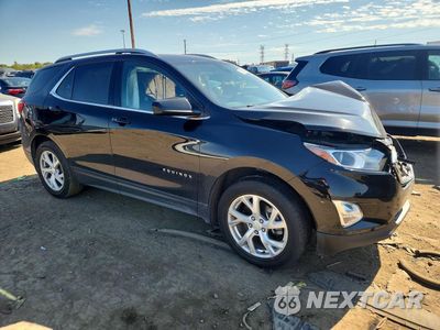 Czwarte zdjęcie samochodu z boku: 2020 CHEVROLET EQUINOX LT VIN:2GNAXVEX6L6123937 - miniatura